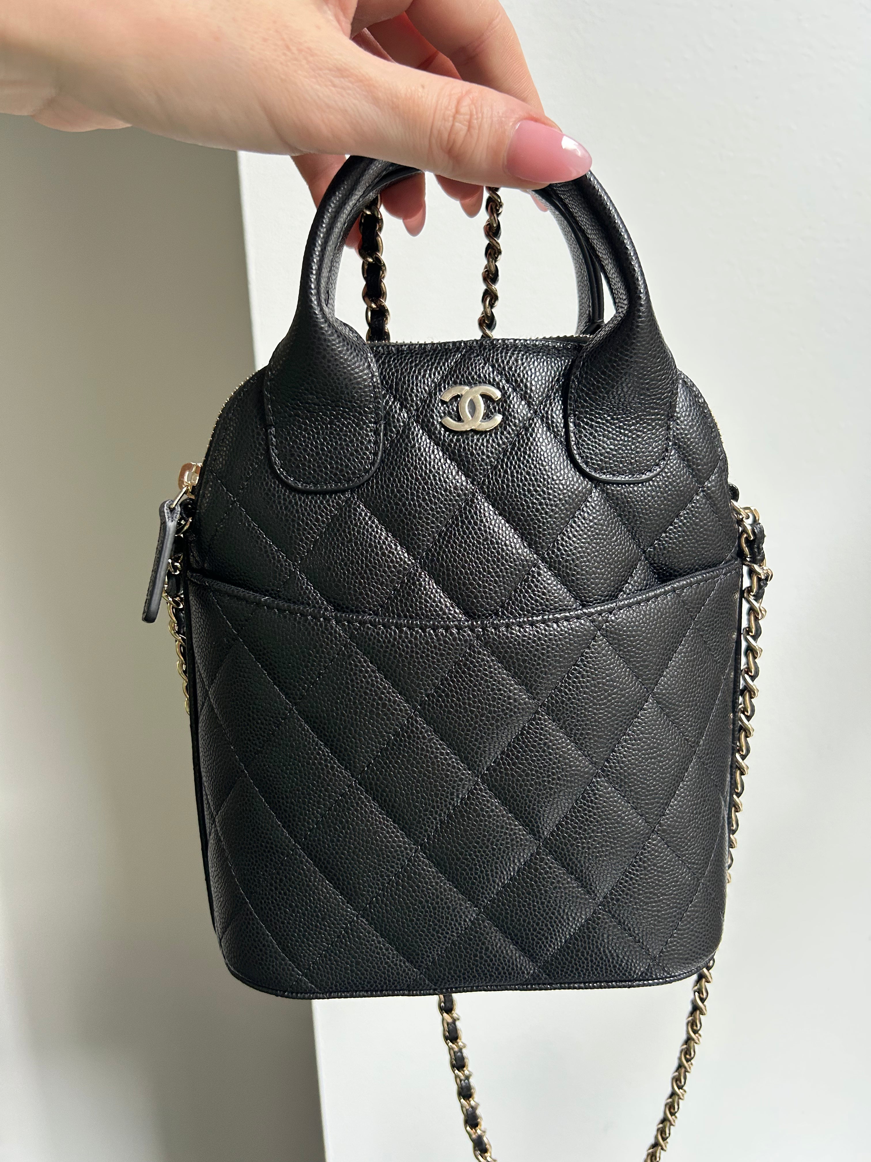 Black Caviar Top Handle Clutch on a Chain