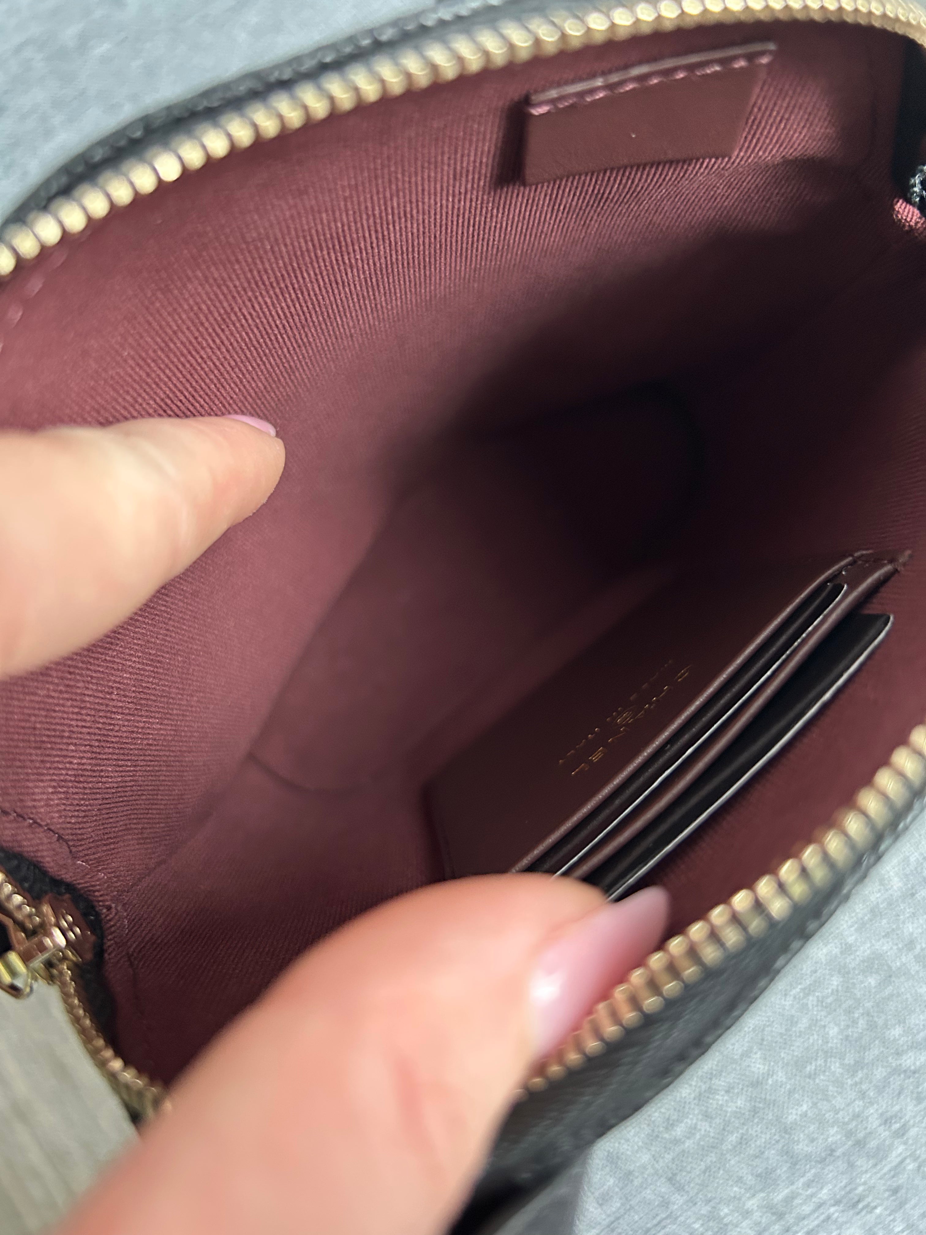 Black Caviar Top Handle Clutch on a Chain