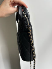Black Caviar Top Handle Clutch on a Chain