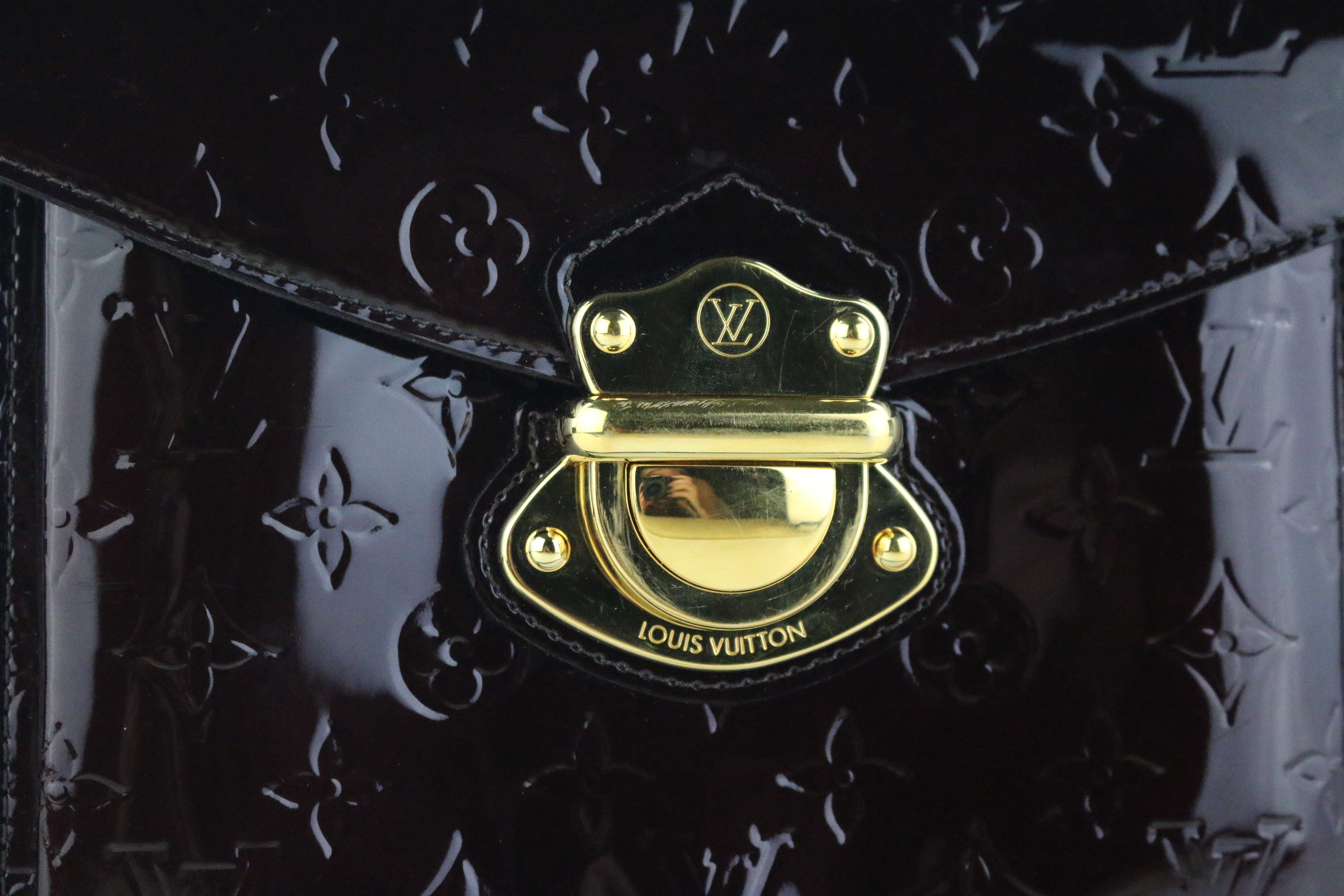 Preowned Authentic Louis Vuitton Amarante Monogram Vernis Rodeo